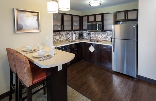 West Omaha Condo | Free Breakfast. Pool. Near the Nebraska Medical Center!