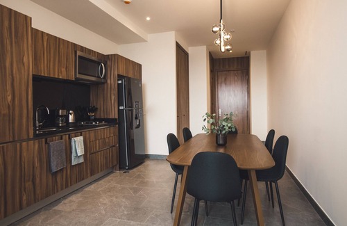 Cuauhtemoc Apartment | Fully equipped kitchen, high speed internet, comfy king-size bed and a small sofa bed.