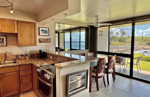 Poipu Condo | Fully Renovated Oceanfront with Air Cond. Ground Floor Unit with Spacious Lanai!