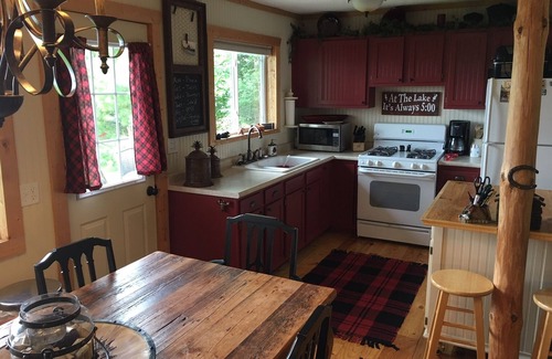 Hillman Cabin | Fun summer getaway, beach, fishing, water sports, clean lake, scrapbooking
