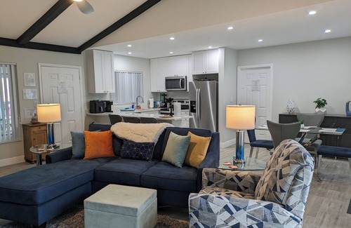 Coral Ridge House | Fun-tastic Oasis! Shared Heated Pool n Spa! Beach 1.4 mi! Walkable Food n Fun!