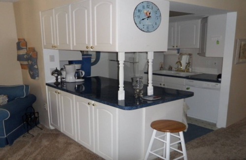 Largo Condo | Furnished One Bedroom Condo. Water View, Heated Pool,remodeled marble bathroom.