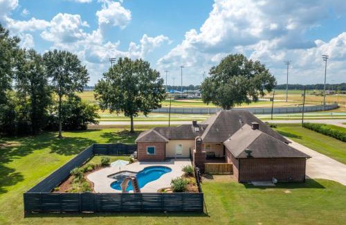 Youngsville House | Gameday Getaway - Pool - King Bed - Sports Complex