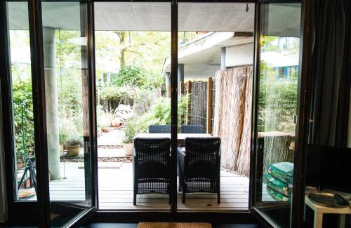 Ehrenfeld House | Gartenzimmer in Atelierwohnung
