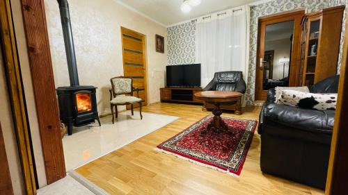 Sieber Apartment | Gemütliches Apartment mit Kamin und Wohnküche