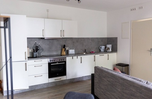 Huenfeld Apartment | Gemütliches Apartment mit Terrasse, Zentral in Hünfeld Nahe der Rhön Gelegen