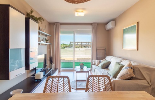 Playa de Almarda Apartment | Global Properties: Ground floor with pool in Almenara