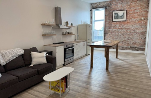 Harwich Apartment | Golden Acre Suites | 3BR Downtown Loft w/Exposed Brick & Urban Charm