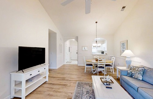 North Myrtle Beach Condo | Golf course-front condo with pools, hot tub, tennis, & in-home washer/dryer