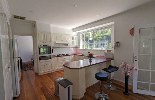 Eltham House | Gorgeous 4-Bedroom Home & Venue on a Mansion - an acre land with Pool & Garden n