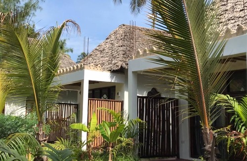 Michamvi Villa | Gorgeous garden bungalows moments to the Indian Ocean