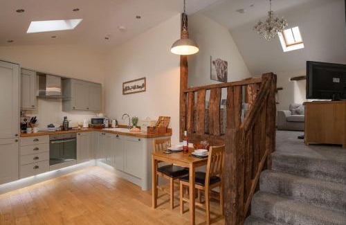 Eglwysbach House | GORSE BARN - A cosy barn conversion in North Wales with a log burner