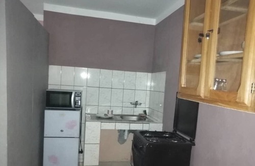 Libreville Apartment | Grande Chambre Américaine Meublée à Alibandeng-libreville