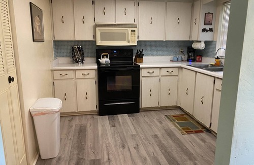 Lasburys Sunset Terrace House | Grandma's Place Large Comfortable Private Home Fenced Backyard Covered Parking