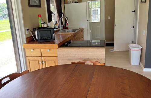 Arlington Cabin | Grandpa’s cozy cabin in Arlington with WiFi, AC, grill,fishing, pedal boat,kayak