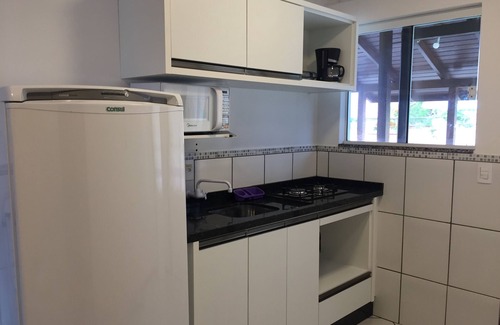 Barra da Lagoa Apartment | Great apartment with air conditioning, near the sea, the lagoon and the river.
