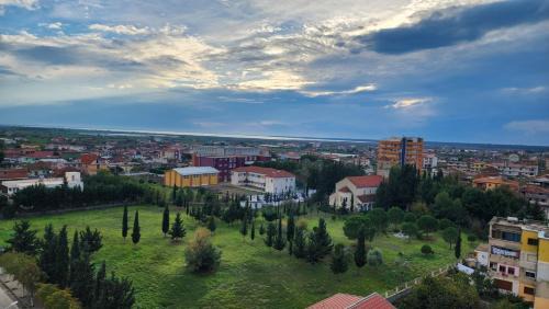Divjake Apartment | Green Trails City Center