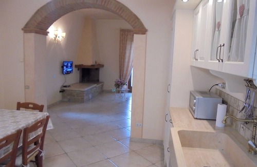 Chianni House | Ground floor apartment with loggia and garden, panoramic view