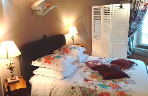 Aydoilles Bed & Breakfast | Guest room with private bathroom in a historic Priory