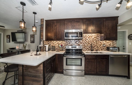 Gulfport House | Gulfport Beach Vacation Rental, 2 Bedroom WINE CELLAR THEMED, 5 Star Beach House