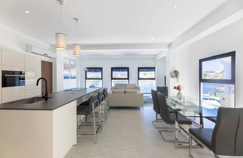 Pietermaai District Apartment | Handelskade's Grand Historical Penthouse: Refined Luxury Living