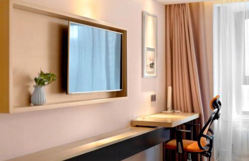 Nangang Qu Hotel | Happy Manju Hotel-Harbin Haxi High-speed Railway West Station Wanda Plaza Branch