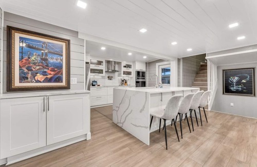 Merritt Island House | Heated Pool, Sleeps 21, 2 Kitchens, Custom Firepit, Outdoor Oasis, Near Beach