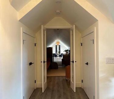 Northeast Edmonton House | Heritage-Inspired Guesthouse - Luxe Bath & Elegant Ceilings