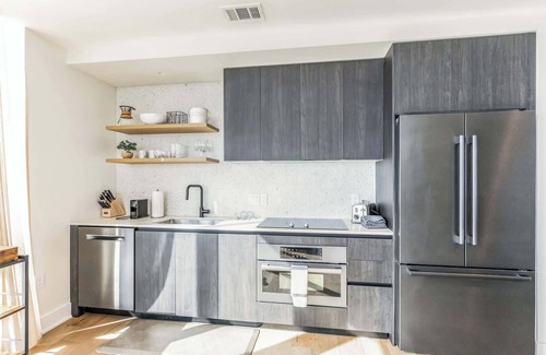 Rainey Street Historic District Condo | High Rise Luxury Condo with Lake & City Views