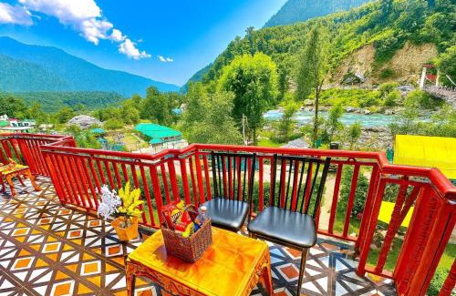 Sasaram Hotel | Himalayan River Resort, Manali- #riverside #private parking #scenic river & mountain view #open cafe # spacious room #big garden with campfire