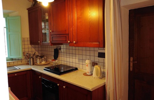 San Quirico d'Orcia Apartment | Historic residence at the well