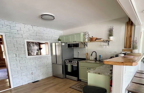 Tweed Cottage | Historic Waterfront Haven in Tweed