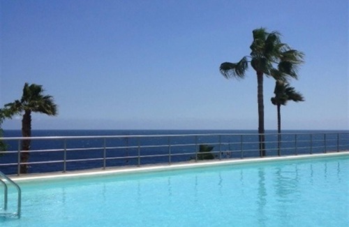 Playa del Aguila House | Holiday Home "Nueva Baviera 42" by the Sea with Garden & Shared Pool