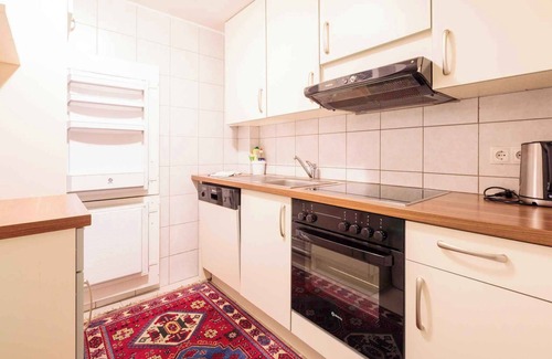 Huben Apartment | Holiday apartment Tyrolean room with tiled stove and dishwasher
