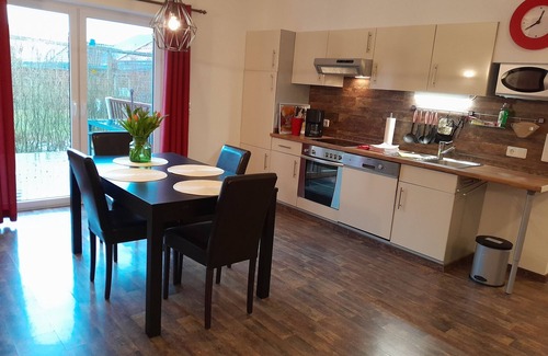Langballig Apartment | Holiday Apartment "Wikingerland Typ 1 Erdgeschoss" with Private Terrace, Shared Garden & Wi-Fi