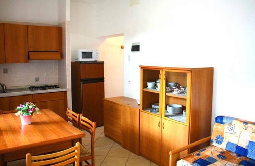 Lignano Sabbiadoro Apartment | Holiday apartment with balcony and air conditioning