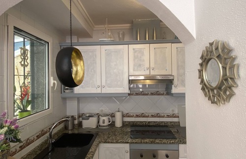San Fulgencio House | Holiday Home 'Casa Palma' with Shared Pool, Wi-Fi and Air Conditioning