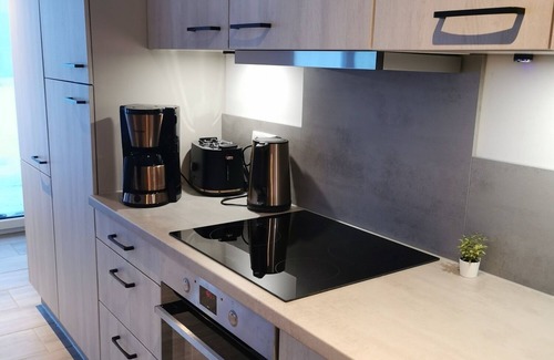 Schulp House | Holiday Home 'Ferienhäuser Ebbe Und Flut' with Private Terrace, Private Garden and Wi-Fi