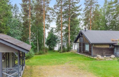 Rautalampi House | Holiday Home Runoniekka by Interhome