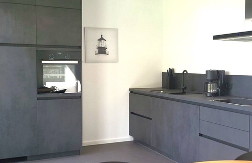 Muldestausee House | Holiday Home 'Schlossterrassen 8b' with Lake View, Private Terrace and Wi-Fi