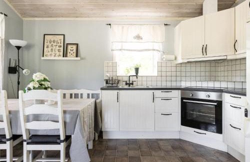 Kalvsvik House | Holiday Home Skärvudde Huset by Interhome