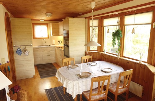 Tived House | Holiday home Tived - directly on lake, sauna, boat, hot tub