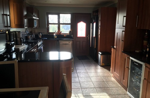 Tenby House | Holiday home with heated outdoor swimming pool May-Sept. Hot tub as extra