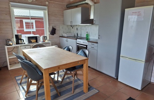 Vackelsang Ski Chalet | Holiday home with lake view, pool and boat in Småland