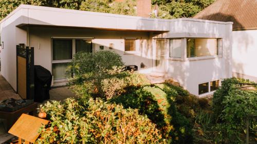 Rollfeld House | Hollands Ferienhaus Genuss am Wald mit Stil 2 SZ Fahrradgarage Klimaanlage