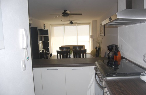 Puerto Juarez Apartment | HOME OFFICE?.ENJOY IT AT CANCUN, AFFORDABLE NICE BEACHFRONT CONDO.