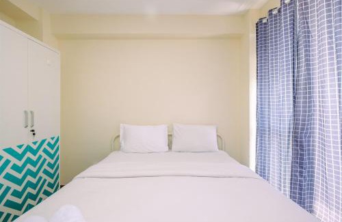Kayu Putih Apartment | Homey and Cozy Living Studio Room at Tifolia Apartment By Travelio