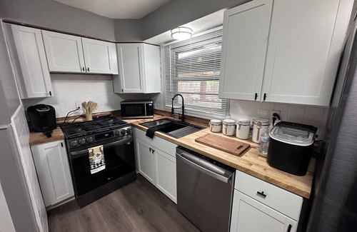 Florissant House | Hot tub getaway home! Relax and recharge at your STL cozy vacation retreat