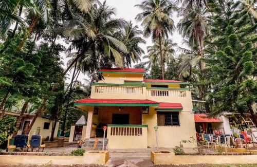 Palghar Hotel | Hotel O Nisarg Resort Satpati Beach