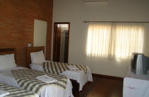 Sertaozinho Hotel | Hotel Pousada Chalé das Flores